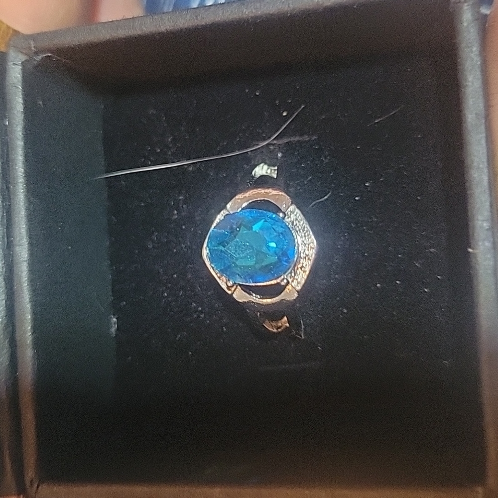 S925 Aquamarine and cubic zirconia.